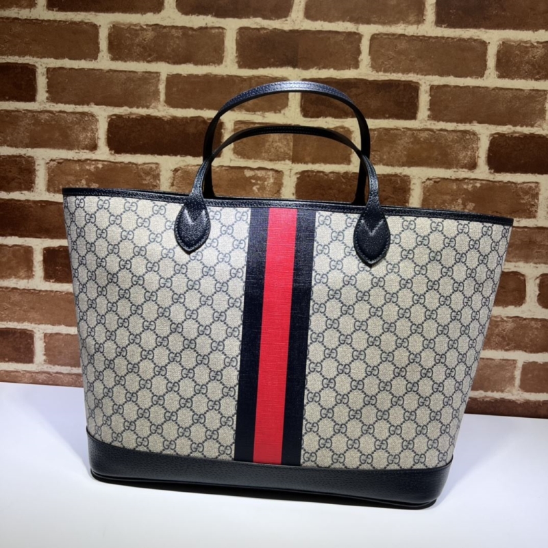 G*u*i shopping bags